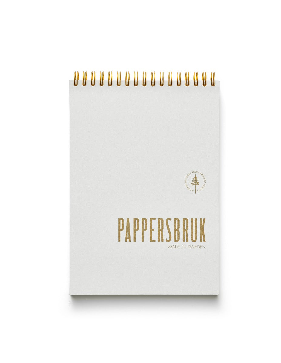 Pappersbruk olinjerade skrivblock